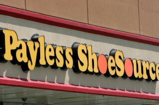 
              FILE- This Aug. 23, 2006, file photo shows a Payless store front is seen in Philadelphia. Paylesss ShoeSource is shuttering all of its 2,100 remaining stores in the U.S. and Puerto Rico, joining a list of iconic names like Toys R Us and Bon-Ton that have been shuttered in the last year. The Topeka, Kansas-based chain said Friday, Feb. 15, 2019 it will hold liquidation sales starting Sunday and wind down its e-commerce operations. (AP Photo/Matt Rourke, File)
            