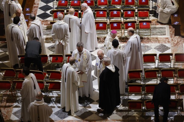 Clergy gather inside Notre Dame Cathedral before France's iconic cathedral is formally reopening its doors for the first time since a devastating fire nearly destroyed the 861-year-old landmark in 2019, Saturday Dec.7, 2024 in Paris ( Ludovic Marin, Pool via AP)