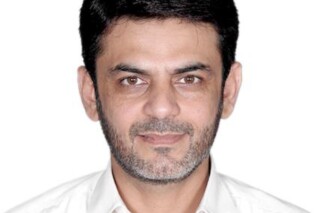 This image provided by the Justice Department, contained in the complaint supporting the arrest warrant, shows Asif Merchant. The Pakistani man alleged to have ties to Iran has been charged in a plot to carry out political assassinations on U.S. soil, the Justice Department said Aug. 6, 2024. (Justice Department via AP)