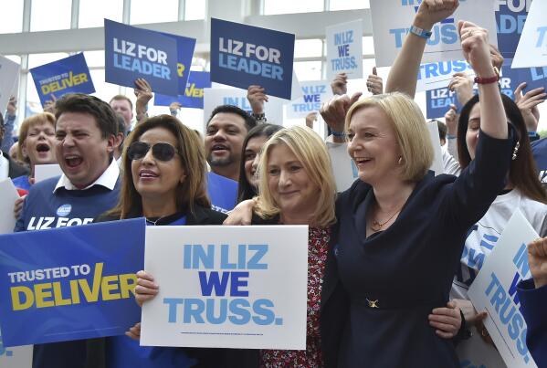 FILE - British Foreign Secretary Liz Truss meets supporters as she arrives to attend a Conservative leadership election hustings at the NEC, Birmingham, England, Tuesday, Aug. 23, 2022 before becoming Britain's new Prime Minister in Sept. On Thursday, Oct. 20, 2022 Truss quit after losing support of Conservative lawmakers following weeks of turmoil over botched economic plan. (AP Photo/Rui Vieira, File)