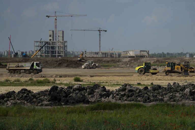 FILE- Construction is underway for a battery factory for electric vehicles built by China-based Contemporary Amperex Technology Co. Limited (CATL) in Debrecen, Hungary on Tuesday, May 23, 2023. (AP Photo/Denes Erdos, File)