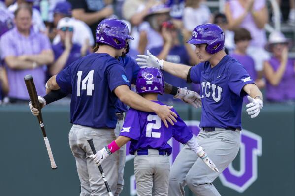 TCU's Cole Fontenelle, right, is congratulated by teammates after hitting a two-run home in the third inning of an NCAA college baseball super regional game against Indiana State in Fort Worth, Texas, Friday, June 9, 2023. (AP Photo/Brandon Wade)
