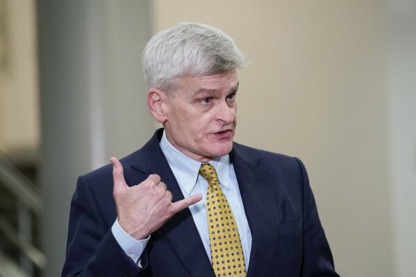 Sen. Bill Cassidy, R-La., talks with reporters on Capitol Hill in Washington, Friday, Feb. 12, 2021, on the fourth day of the second impeachment trial of former President Donald Trump. (AP Photo/Susan Walsh)