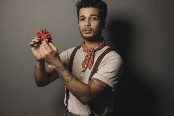 This Nov. 8, 2023 photo released by DKC/O&M shows actor Jordan Fisher, who will succeed original cast member Reeve Carney in the Broadway musical "Hadestown." The actor, whose Broadway credits also include “Dear Evan Hansen,” “Sweeney Todd” and “Hamilton,” will step into the role of Orpheus beginning Monday at the Walter Kerr Theatre. (Andy Henderson/DKC/O&M via AP)