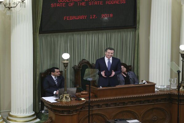 
              California Gov. Gavin Newsom delivers his first of state of the state address to a joint session of the legislature at the Capitol Tuesday, Feb. 12, 2019, in Sacramento, Calif. (AP Photo/Rich Pedroncelli)
            