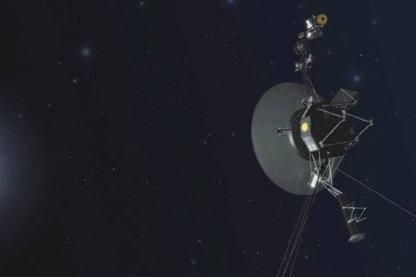 This illustration provided by NASA depicts Voyager 1. The most distant spacecraft from Earth stopped sending back understandable data in November 2023. Flight controllers traced the blank communication to a bad computer chip and rearranged the spacecraft’s coding to work around the trouble. In mid-April 2024, NASA’s Jet Propulsion Laboratory declared success after receiving good engineering updates. The team is still working to restore transmission of the science data. (NASA via AP)
