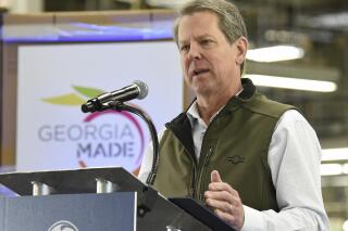 Georgia Governor Brian Kemp speaks at the Roper Corporation Cooking Products Plant in Lafayette, Ga. on Friday, Jan. 7, 2022.  Kemp visited the plant after GE Appliances recently invested a $118 million expansion in Georgia.  (Matt Hamilton /Chattanooga Times Free Press via AP)