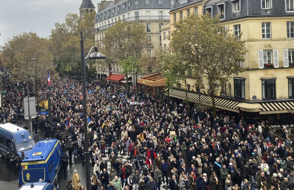 FILE - Thousands gather for a march against antisemitism in Paris, France, on Nov. 12, 2023. Antisemitism is spiking across Europe after Hamas' Oct. 7 massacre and Israel's bombardment of Gaza, worrying Jews from London to Geneva and Berlin. (AP Photo/Sylvie Corbet, File)