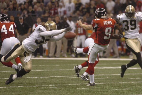 FILE - In this Sept. 25, 2006, file photo, New Orleans Saints' Steve Gleason blocks a punt which the Saints ran in for the first score of an NFL football game against the Atlanta Falcons, at the Louisiana Superdome in New Orleans.  (Michael DeMocker/The Times-Picayune/The New Orleans Advocate via AP, File)