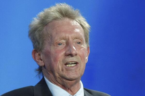 FILE - In this file photo dated Thursday, Aug. 30, 2012, former player Denis Law during the UEFA Champions League draw in Monaco.  81-year old Former Manchester United striker Denis Law said Thursday Aug. 19, 2021, he wanted to be open about his condition after being diagnosed with two types of dementia.  (AP Photo/Claude Paris, FILE)