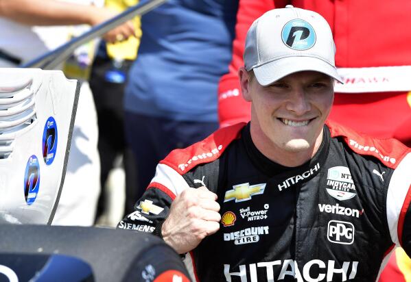 IndyCar driver Josef Newgarden, from Nashville, Tenn., celebrates after capturing the top qualifying position Saturday, Sept. 25, 2021, for the Acura Grand Prix of Long Beach, in Long Beach, Calif. (Will Lester/The Orange County Register via AP)