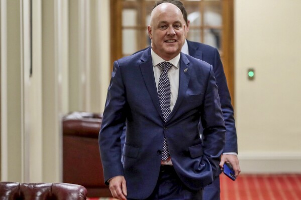 New Zealand's incoming Prime Minister Christopher Luxon walks through the corridors following the results of the Special Votes from the Oct. 14 general election, at Parliament in Wellington, New Zealand, Friday, Nov. 3, 2023. (Mark Mitchell/NZ Herald via AP)