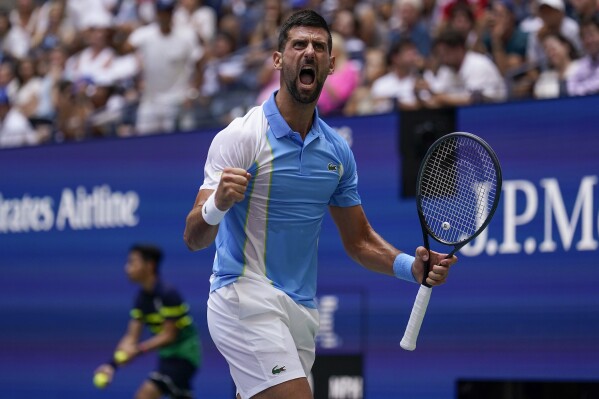 Novak Djokovic, of Serbia, reacts during a match against Taylor Fritz, of the United States, during the quarterfinals of the U.S. Open tennis championships, Tuesday, Sept. 5, 2023, in New York. (AP Photo/Seth Wenig)