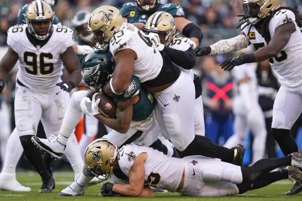 Saints manage late TD, secure NFC's top seed