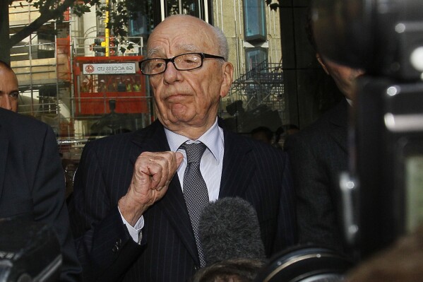 FILE - Rupert Murdoch talks with the media in London, July 15, 2011. Murdoch, 93, has married for the fifth time, News Corp. said Sunday, June 2, 2024. Murdoch and Elena Zhukova, a 67-year-old Russian-born retired molecular biologist, wed Saturday in a ceremony at his California vineyard. (AP Photo/Kirsty Wigglesworth, File)
