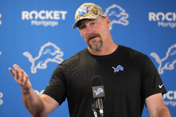 Detroit Lions head coach Dan Campbell talks to the media before an NFL football practice, Tuesday, June 4, 2024, in Allen Park, Mich. (AP Photo/Carlos Osorio)
