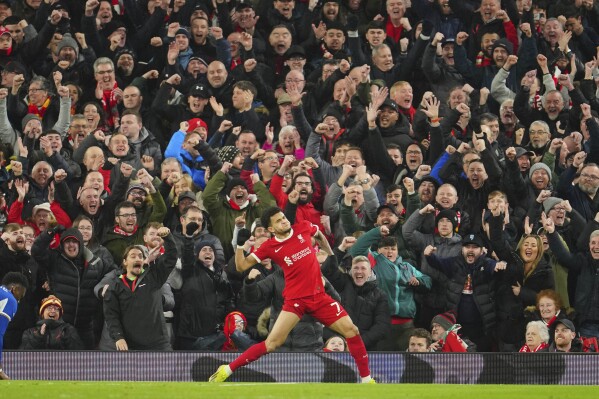 Liverpool's Luis Diaz celebrates after scoring his side's fourth goal during the English Premier League soccer match between Liverpool and Chelsea, at Anfield Stadium, Liverpool, England, Wednesday, Jan.31, 2024. (AP Photo/Jon Super)