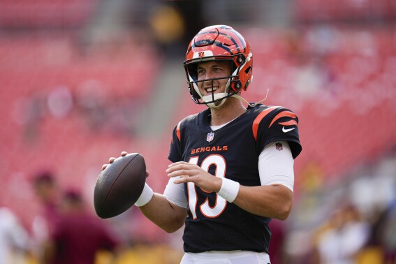FILE - Cincinnati Bengals quarterback Trevor Siemian works out prior to an NFL preseason football game between the Cincinnati Bengals and the Washington Commanders, Saturday, Aug. 26, 2023, in Landover, Md. The New York Jets are adding veteran quarterback Trevor Siemian to the practice squad, according to a person with knowledge of the decision. The move is pending a physical for the 31-year-old Siemian, the person told The Associated Press on condition of anonymity because the team hadn't announced the signing. (AP Photo/Julio Cortez, File)