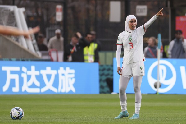 Morocco's Nouhaila Benzina gestures during the Women's World Cup Group H soccer match between South Korea and Morocco in Adelaide, Australia, Sunday, July 30, 2023. (AP Photo/James Elsby)