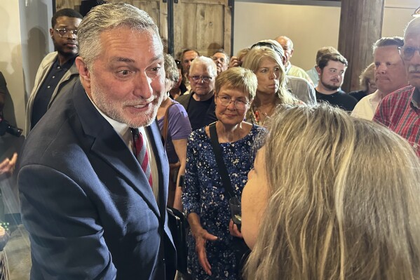 John Reid, Virginia's Republican nominee for lieutenant governor, greets supporters at his rally at Atlas 42 in Glen Allen, Va., Wednesday, April 30, 2025. (AP Photo/Olivia Diaz)