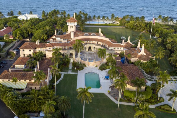 FILE - An aerial view of President Donald Trump's Mar-a-Lago estate is seen Aug. 10, 2022, in Palm Beach, Fla. A witness in the criminal case against Donald Trump over the hoarding of classified documents retracted “prior false testimony” after switching lawyers last month and provided new information that implicated the former president, the Justice Department said Tuesday, Aug. 22, 2023. (AP Photo/Steve Helber, File)