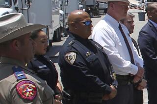 In this May 26, 2022, photo, Uvalde School Police Chief Pete Arredondo, third from left, stands during a news conference outside of the Robb Elementary school in Uvalde, Texas. Facing massive public pressure, Uvalde’s top school official has recommended the firing of the school district police chief who was central to the botched law enforcement response to the shooting at an elementary school that killed two teachers and 19 students.
The city’s school board will consider firing Arrendondo at a special meeting Saturday, July 23, to consider the superintendent's recommendation. (AP Photo/Dario Lopez-Mills, FILE)