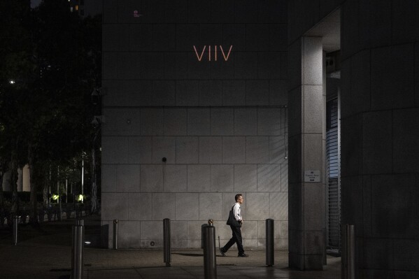 A projection of “VIIV”, Roman numerals in reference to June 4, displayed on the wall outside the British Consulate in Hong Kong on the 36th anniversary of China's Tiananmen Square crackdown, in Hong Kong, Wednesday, June 4, 2025. (AP Photo/Chan Long Hei)