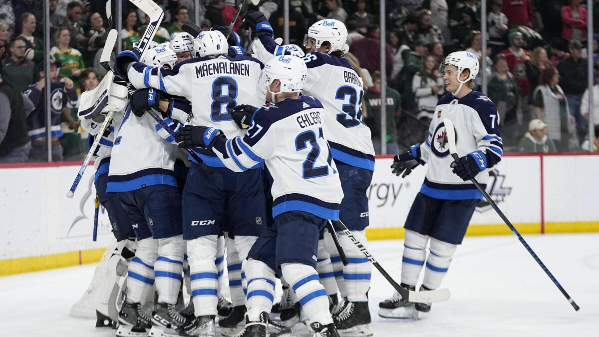 Jets clinch playoff spot with feisty 3-1 win vs. Wild