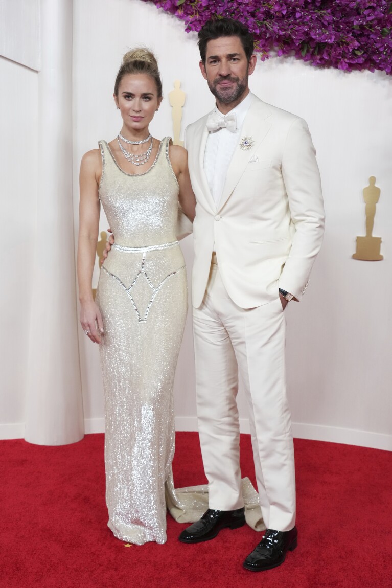 Emily Blunt, left, and John Krasinski arrive at the Oscars on Sunday, March 10, 2024, at the Dolby Theatre in Los Angeles. (Photo by Jordan Strauss/Invision/AP)