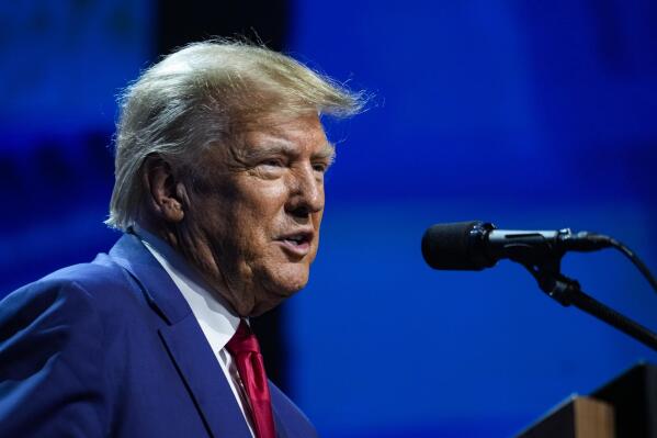 Former President Donald Trump speaks at the National Rifle Association Convention in Indianapolis, Friday, April 14, 2023. (AP Photo/Michael Conroy)