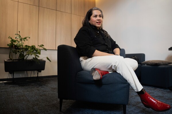 Mexican singer Vivir Quintana gives an interview about her new album “Cosas que Sorprenden a la Audiencia” or Things that Surprise the Audience, in Mexico City, Wednesday, April 23, 2025. Quintana's first "corridos" album tells the stories of women who were incarcerated for killing their abusers while defending themselves. (AP Photo/Aurea Del Rosario)