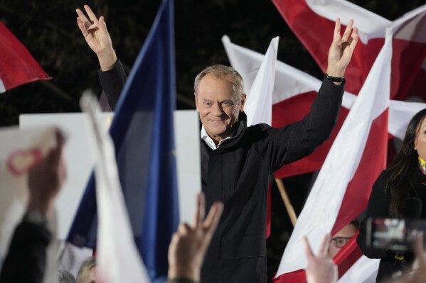 Poland's main opposition leader Donald Tusk speaks to supporters after taking part in an electoral debate in Warsaw, Poland, Monday, Oct. 9, 2023. Leading Polish candidates are holding an energized debate on state TV Monday in which they hope to sway undecided voters, six days before a national election that many Poles believe is the most important one since communism was toppled. (AP Photo/Czarek Sokolowski)