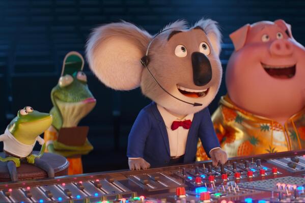 This image released by Illumination Entertainment and Universal Pictures shows, from second left, Miss Crawly, voiced by Garth Jennings,  Buster Moon, voiced by Matthew McConaughey, and Gunter, voiced by Nick Kroll, from the animated film "Sing 2." (Illumination Entertainment and Universal Pictures via AP)