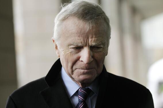 FILE - In this file photo dated Monday, Dec. 5, 2011, former Formula One chief Max Mosley arrives at a Select Committee hearing on privacy and injunctions, in London.  Former Formula One boss and privacy campaigner Max Mosley has died on Sunday May 23, aged 81, it is announced Monday May 24, 2021. (AP Photo/Sang Tan, FILE)