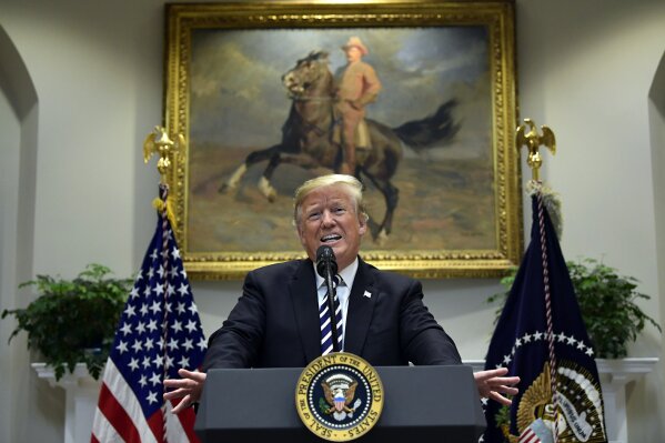 
              FILE - In this Nov. 1, 2018, file photo, President Donald Trump talks about immigration and gives an update on border security from the Roosevelt Room of the White House in Washington. Civil liberties groups have filed a lawsuit in federal court in San Francisco to block the Trump administration from returning asylum seekers to Mexico while their cases wind through U.S. immigration courts. The American Civil Liberties Union and other groups said in the suit filed Thursday, Feb. 14, 2019, that the policy puts asylum seekers in danger and violates U.S. immigration law. (AP Photo/Susan Walsh, File)
            