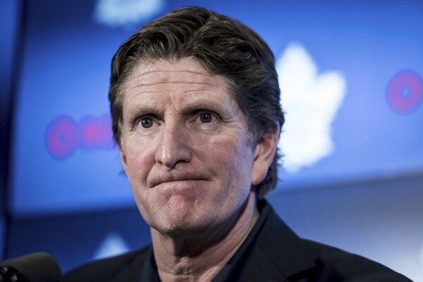 FILE - Then-Toronto Maple Leafs coach Mike Babcock speaks to reporters, April 25, 2019, in Toronto. Babcock resigned as coach of the Columbus Blue Jackets on Sunday, Sept. 17, 2023, after word emerged earlier this week of him asking players to show him photos on their phones. (Christopher Katsarov/The Canadian Press via AP, File)