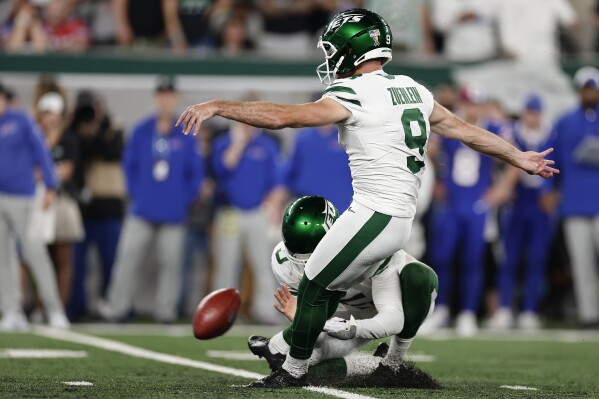 New York Jets place kicker Greg Zuerlein (9) kicks a field goal against the Buffalo Bills during the fourth quarter of an NFL football game, Monday, Sept. 11, 2023, in East Rutherford, N.J.(AP Photo/Adam Hunger)