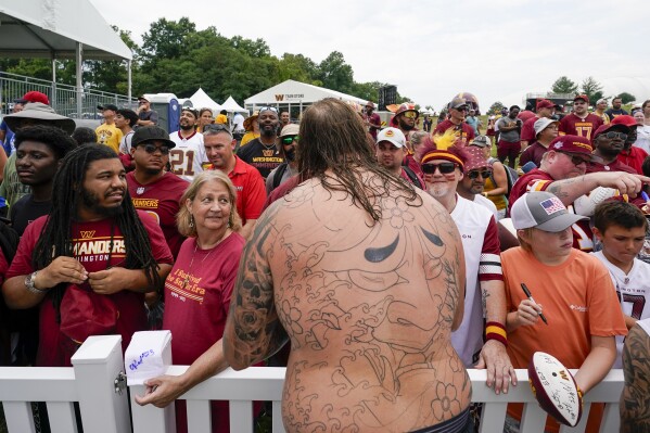 Fans return to Washington Commanders camp to celebrate the team's ownership  change