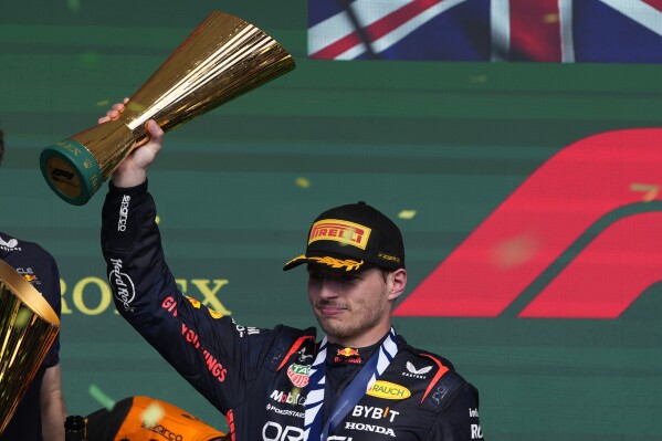 Why is the F1 drivers' trophy awarded weeks after the season ends