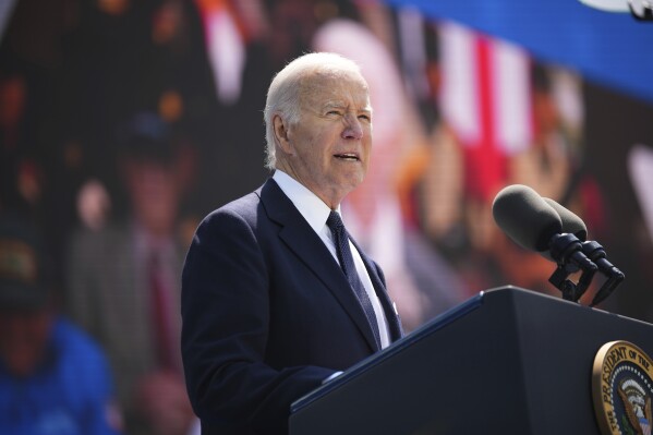 President Joe Biden delivers a speech during a commemorative ceremony to mark D-Day 80th anniversary, Thursday, June 6, 2024 at the US cemetery in Colleville-sur-Mer, Normandy. Normandy is hosting various events to officially commemorate the 80th anniversary of the D-Day landings that took place on June 6, 1944. (AP Photo/Daniel Cole, Pool)