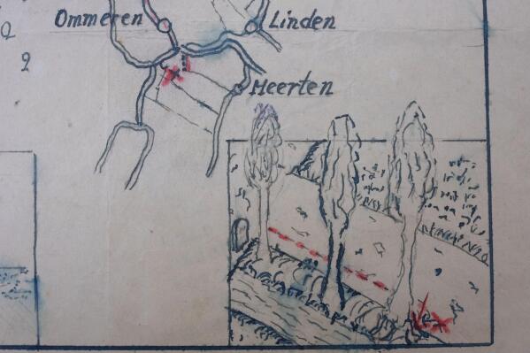Detail of the map showing where the Nazi loot was reportedly buried in Ommeren, near Arnhem, is seen at the National Archive of the Netherlands in The Hague, Monday, Jan. 23, 2023. A hand-drawn map with a red letter X purportedly showing the location of a buried stash of precious jewellery looted by Nazis from a blown-up bank vault has sparked a modern-day treasure hunt in a tiny Dutch village. (AP Photo/Peter Dejong)