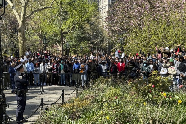 No, immigrants did not storm New York City Hall in pursuit of luxury hotel rooms