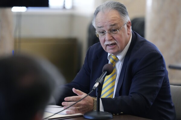 FILE - Mississippi Rep. Gene Newman, R-Pearl, speaks, Feb. 15, 2024, at the Mississippi Capitol in Jackson, Miss. State lawmakers advanced a bill sponsored by Newman out of a House committee Thursday, Feb. 22, that would require inmate restrooms, changing rooms and sleeping quarters in correctional facilities to be designated for use only by members of one sex. If prisoners encounter someone of the opposite sex in any of those areas, they could sue the prison. (AP Photo/Rogelio V. Solis, File)