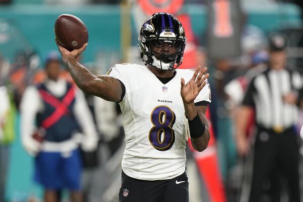 Baltimore Ravens quarterback Lamar Jackson (8) aims a pass during the first half of an NFL football game against the Miami Dolphins, Thursday, Nov. 11, 2021, in Miami Gardens, Fla. (AP Photo/Wilfredo Lee)