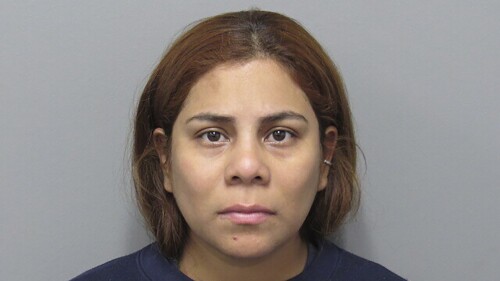 In this booking photo provided by the Cuyahoga County Sheriff's Department, is Kristel Candelario, 31, of Cleveland, Ohio. Prosecutors in Ohio have announced murder charges against a woman in the death of her 16-month-old daughter, who authorities allege was left alone for 10 days while she went on vacation. (Cuyahoga County Sheriff's Department via AP)