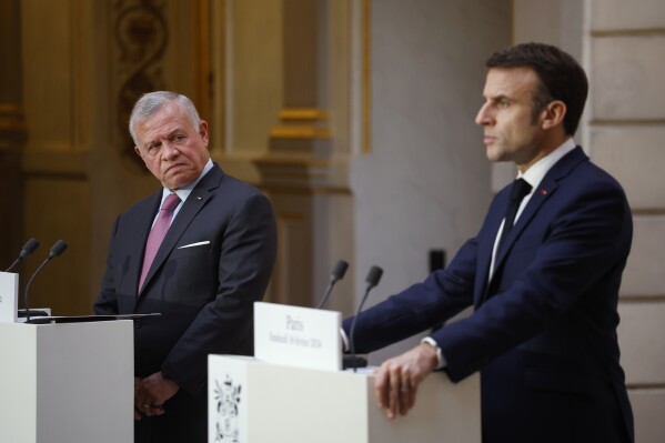 French President Emmanuel Macron, right, and Jordan's King Abdullah II address a joint statement Friday, Feb. 16, 2024 at the Elysee Palace in Paris. King Abdullah II meets Emmanuel Macron after urging Biden to push for a cease-fire in Gaza. (Yoan Valat, Pool via AP)