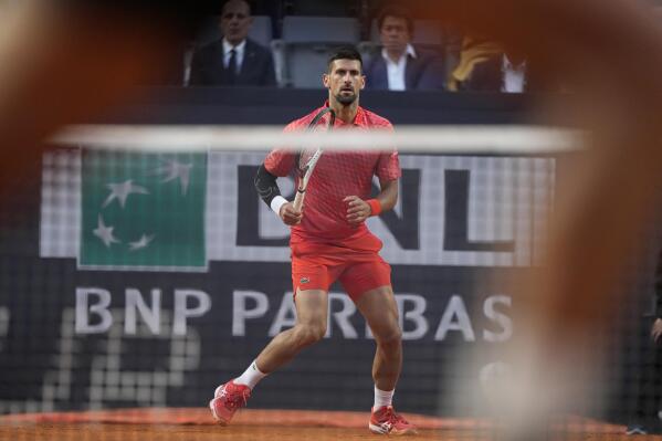 Djokovic tested by Etcheverry in opening Italian Open win; Swiatek cruises
