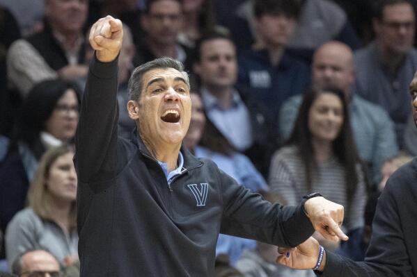 Villanova head coach Jay Wright shouts during the first half of an NCAA college basketball game against Providence, Tuesday, March 1, 2022, in Villanova, Pa. (AP Photo/Laurence Kesterson)