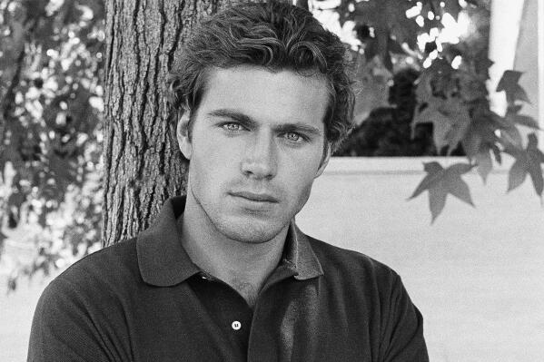 FILE - In this Nov. 12, 1982, file photo, actor Jon-Erik Hexum poses for a picture. In 1984, Hexum died after shooting himself in the head with a prop gun blank while pretending to play Russian roulette with a .44 Magnum on the set of the television series “Cover Up.” Court records show that an assistant director unwittingly handed Alec Baldwin a loaded weapon and told him it was safe to use in the moments before the actor fatally shot a cinematographer on the set of a Western, Thursday, Oct. 21, 2021. (AP Photo/Wally Fong, File)