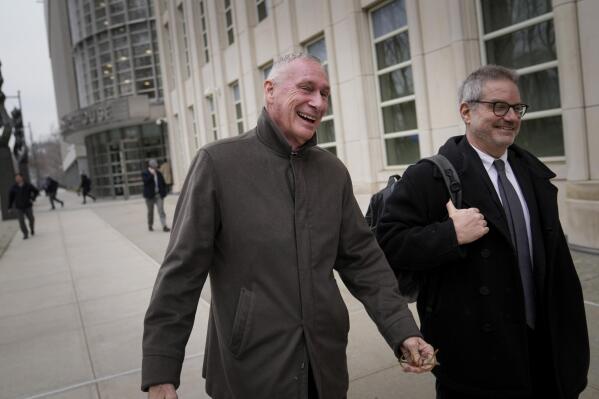 Former ESPN president John Skipper leaves federal court after testifying in a corruption case, Tuesday, Feb. 21, 2023, in New York. The trial in New York City is the latest development in a tangled corruption scandal that dates back nearly a decade and has ensnared more than three dozen executives and associates in the world's most popular sport. (AP Photo/John Minchillo)
